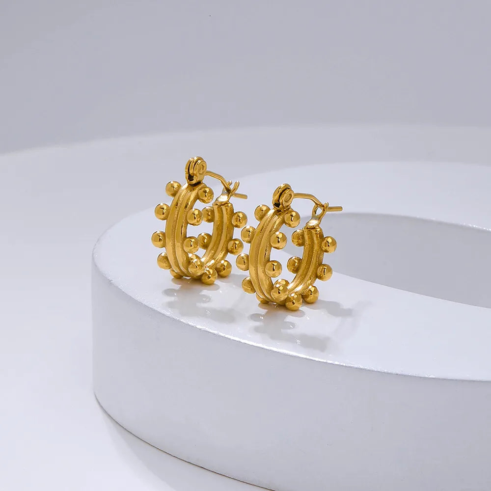 Una U-Shape Gold Earrings